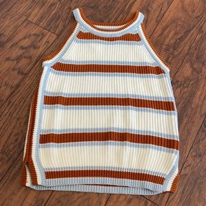 brown and blue striped tank.